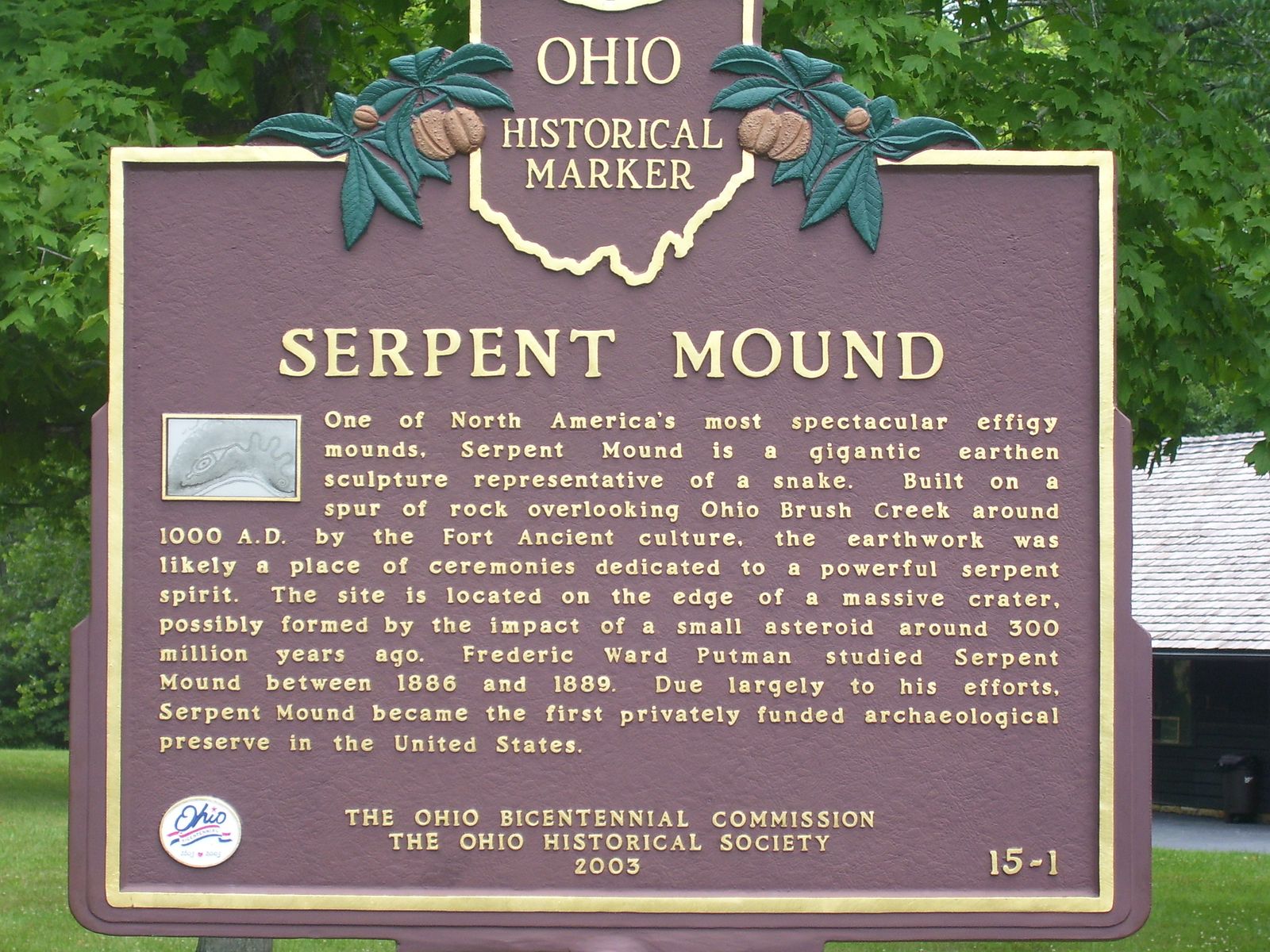 A cast metal Ohio Historical Marker headed SERPENT MOUND, its text dating the earthwork to around 1000 A.D. and the Fort Ancient culture.